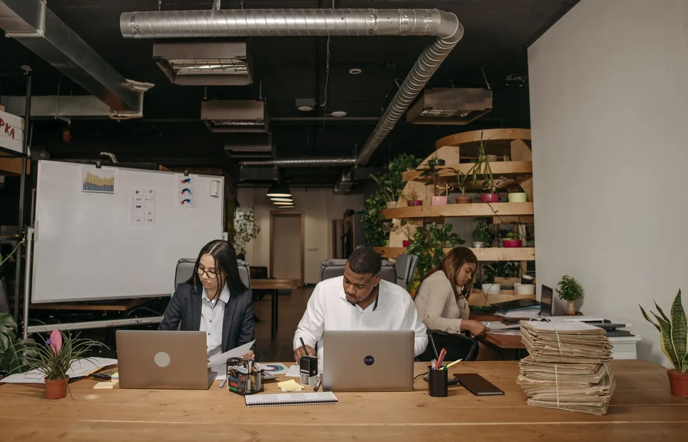 Mednoria RCM corporate team collaborating in a modern office
